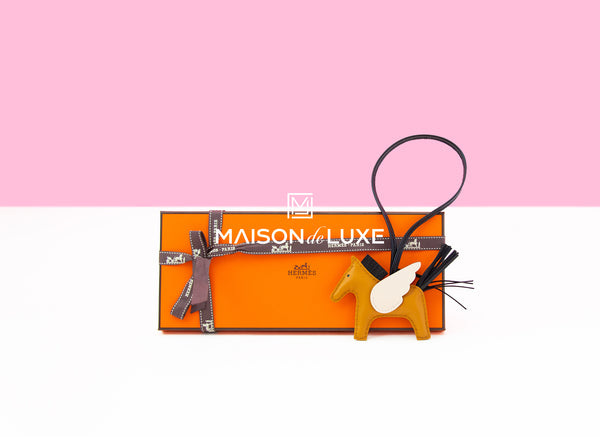 Hermes Black Rodeo Bag Charm Key Chain Pom Pom Carmen – MAISON de LUXE