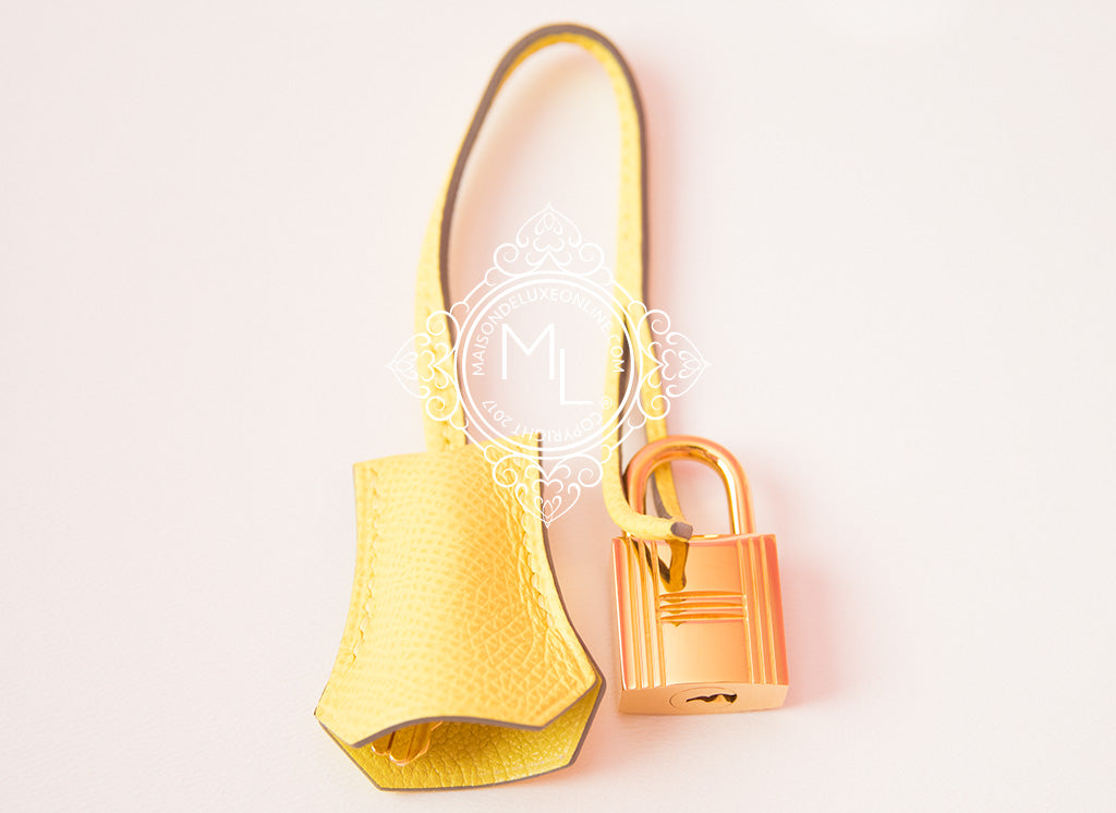 Look no further than this authentic Hermès 25 cm Lime Yellow Epsom